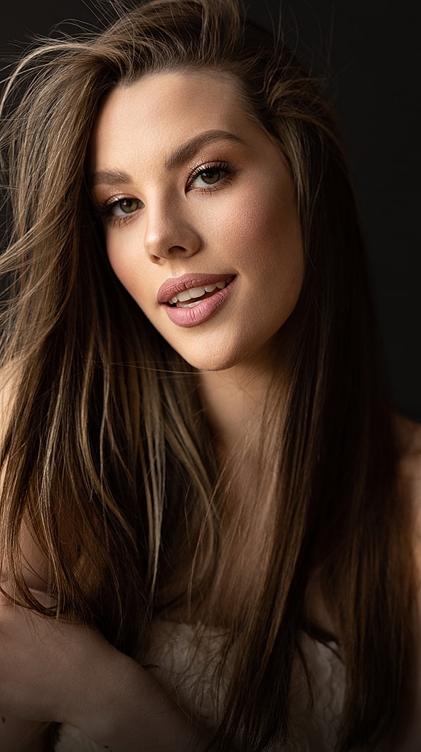 Portrait of a woman with long hair.