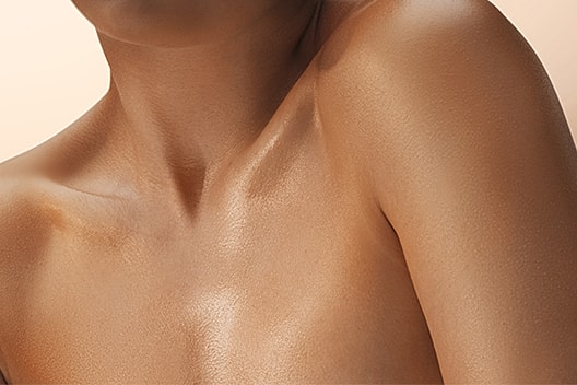 Botox injection procedure on a woman's forehead.