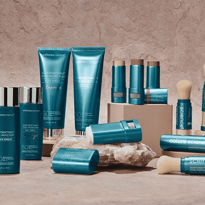 Sunscreen and skincare products arranged aesthetically.