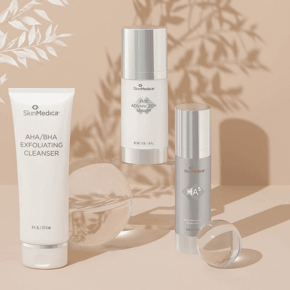 SkinMedica skincare products on a neutral background.